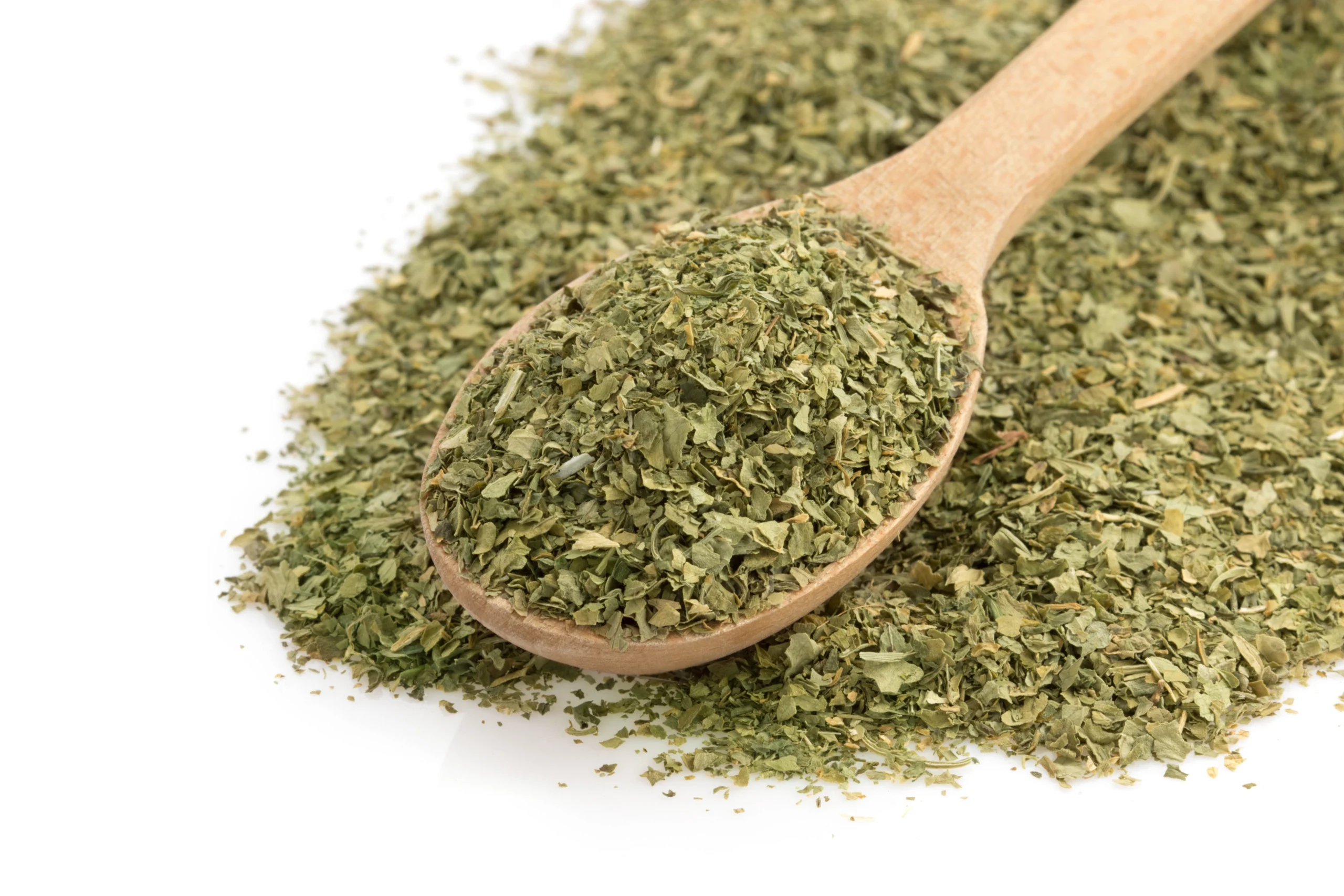 dried-green-spices-spoon-isolated-white-background